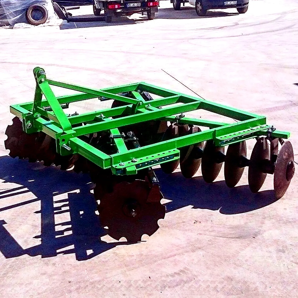 Green disc harrow farm implement