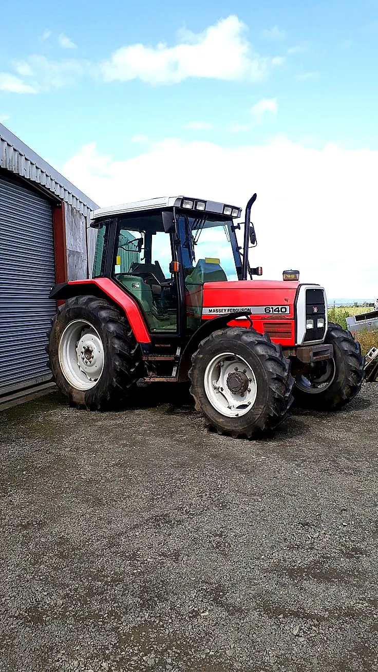 Tractor side view in a yard